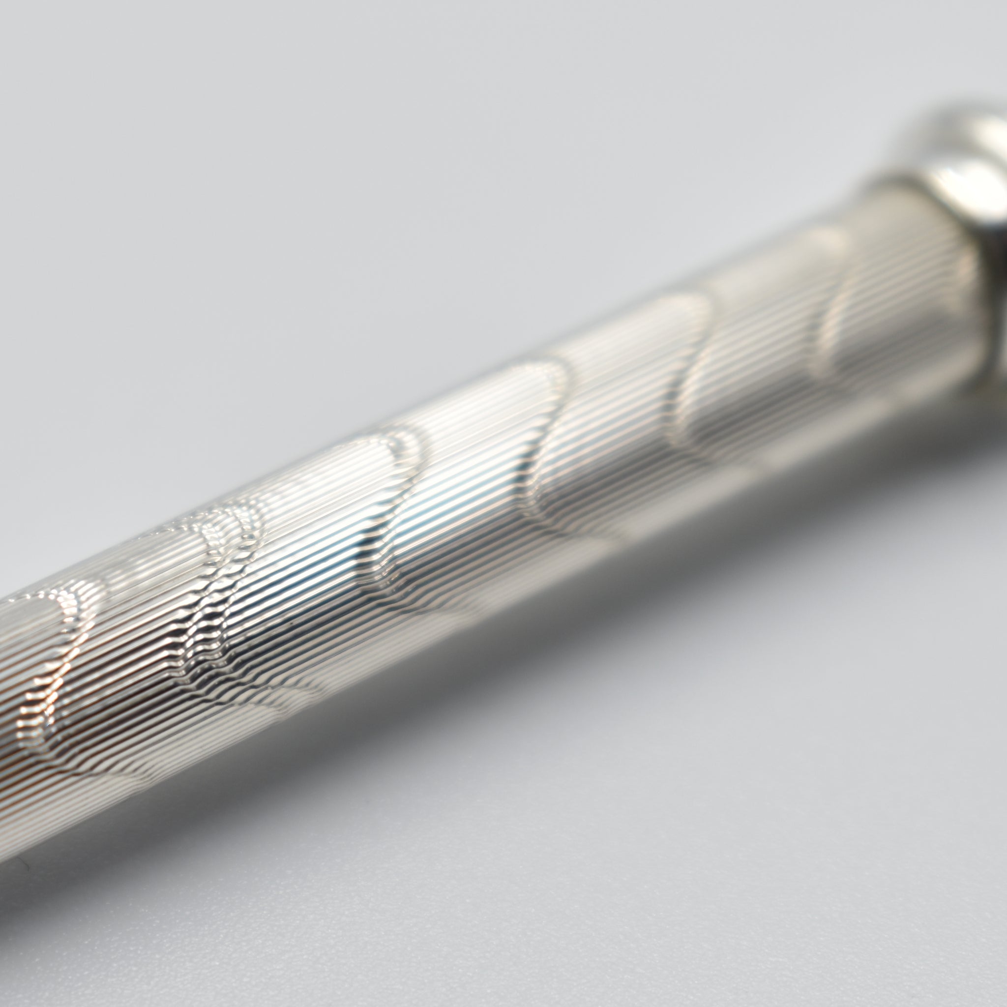 スターリングシルバー 波模様エンジンタン – E-PENSHIMADA